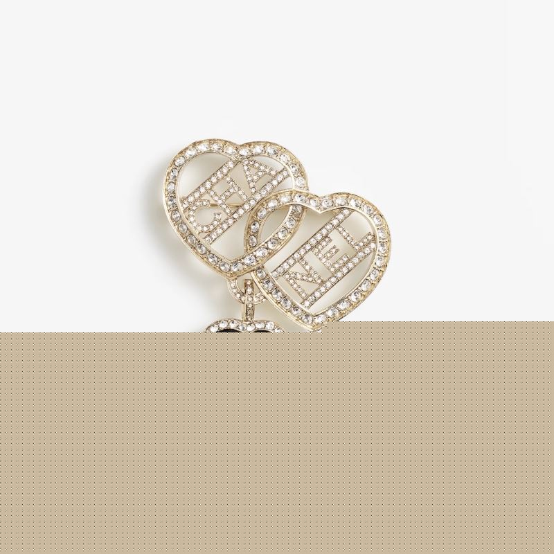 Ch*el brooches